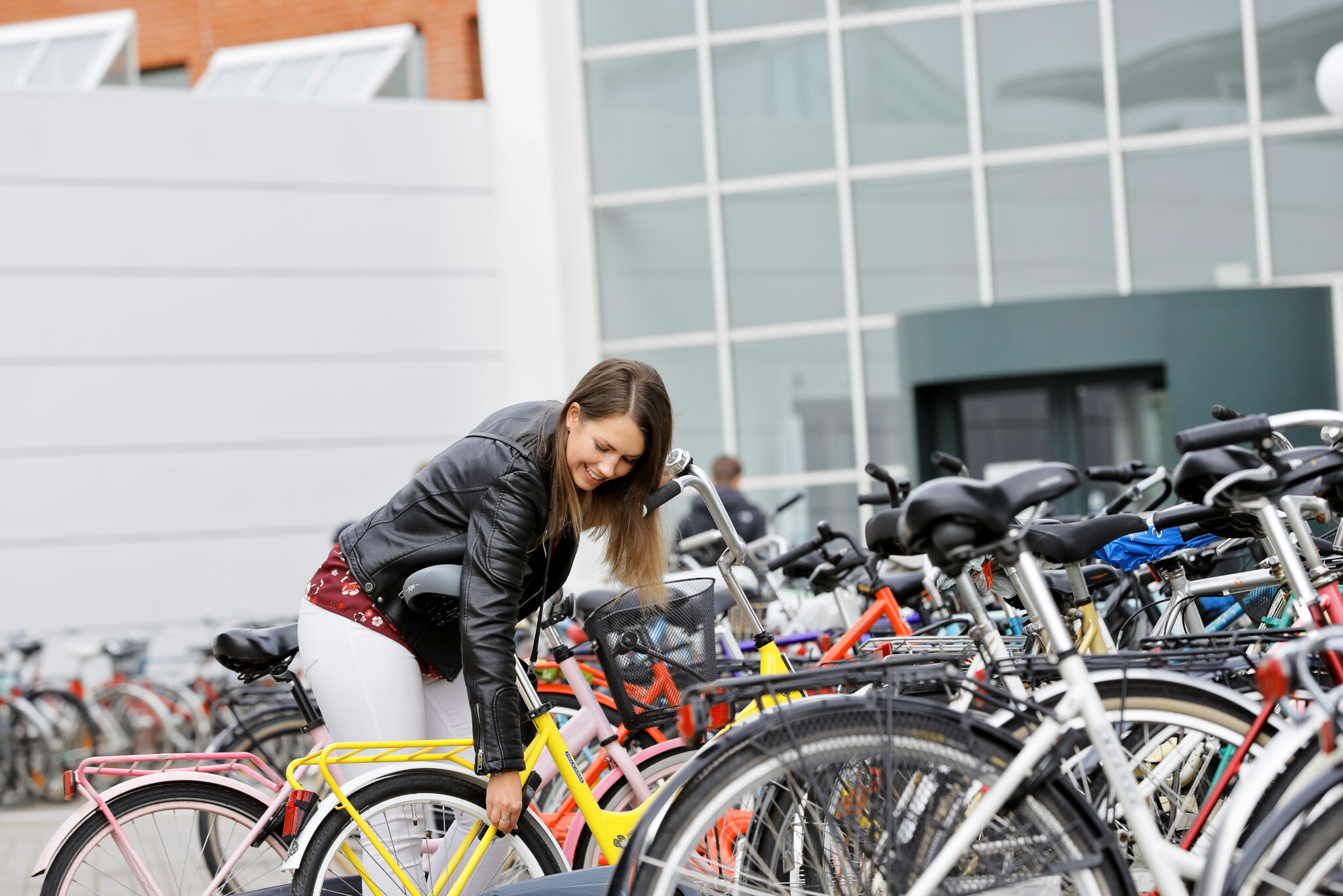 a girl locks her bike