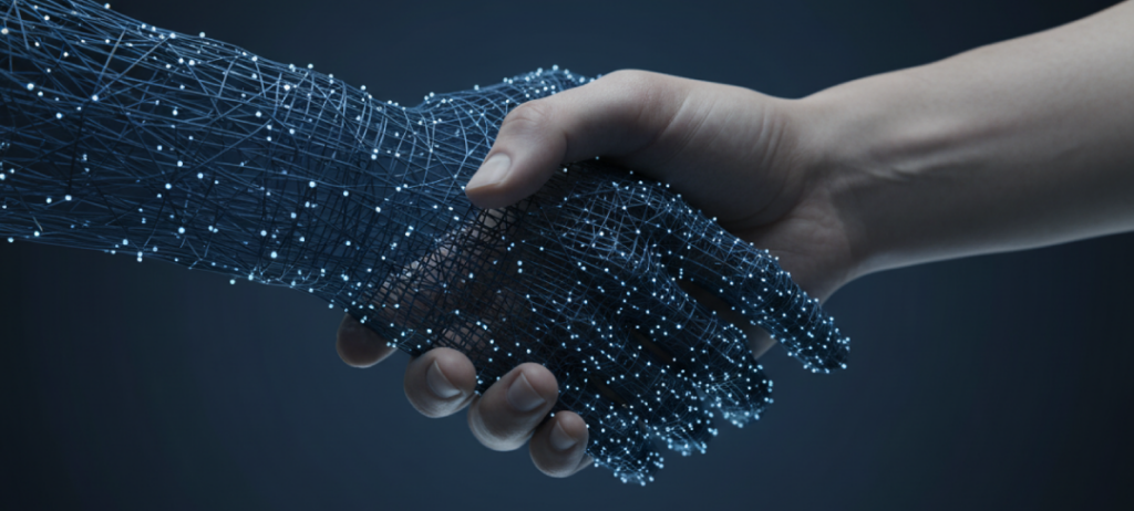 Digitaalisen hahmon käsi ja ihmisen käsi kättelevät