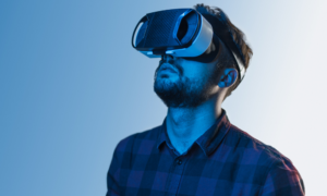 Man using VR glasses. Main VME homepage image.