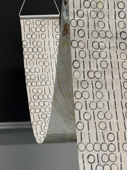 Pianola scroll draping with 1s and 0s